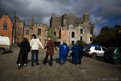 Members walk to the Castle